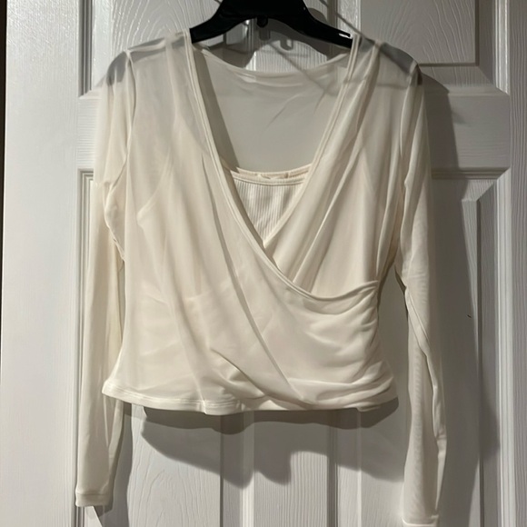 Ultra Flirt Cream Asymmetrical Fitted Tank Top - Picture 1 of 6